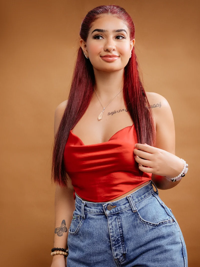 Woman in red on golden background