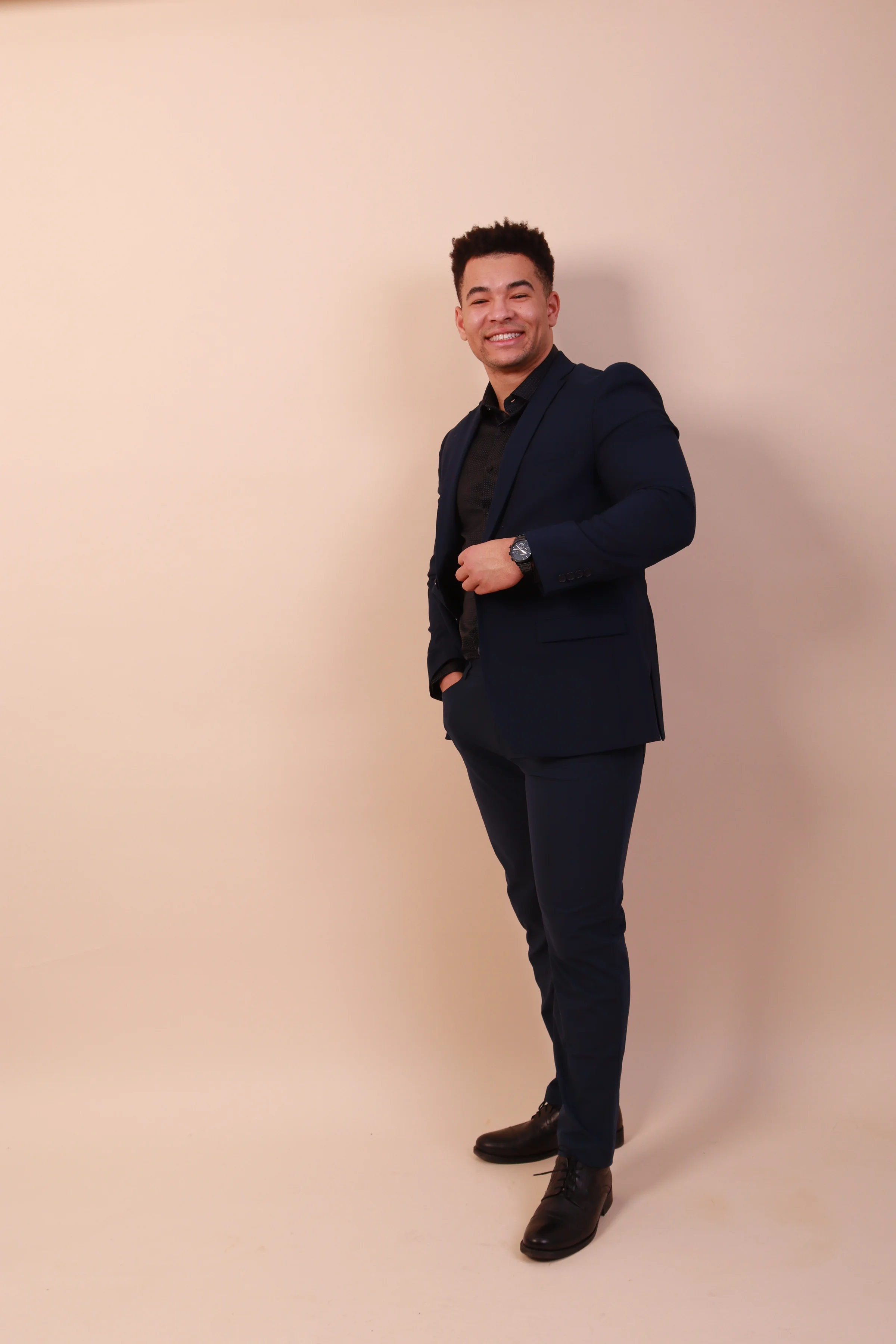 Man in navy suit portrait